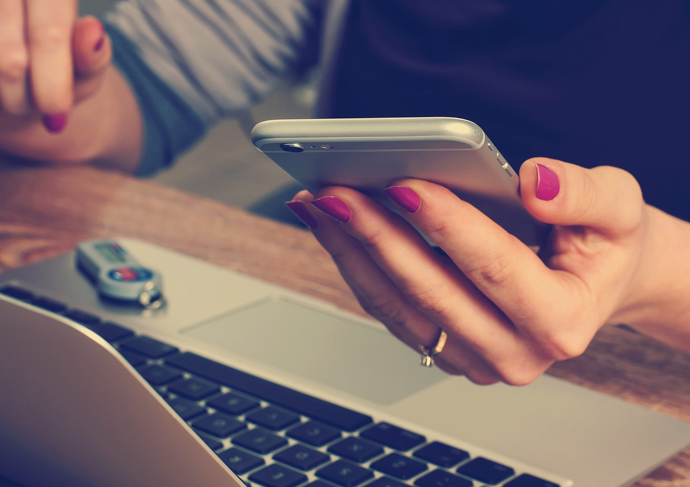 woman with phone in hand